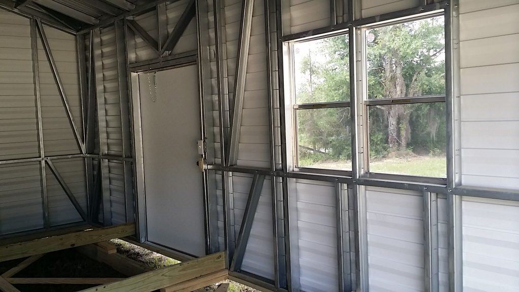 Steel framed shed with metal siding and windows with garage door Robin sheds Probuilt Structures Sheds For Sale In Central Florida Shed in citrus county and sheds in marion county