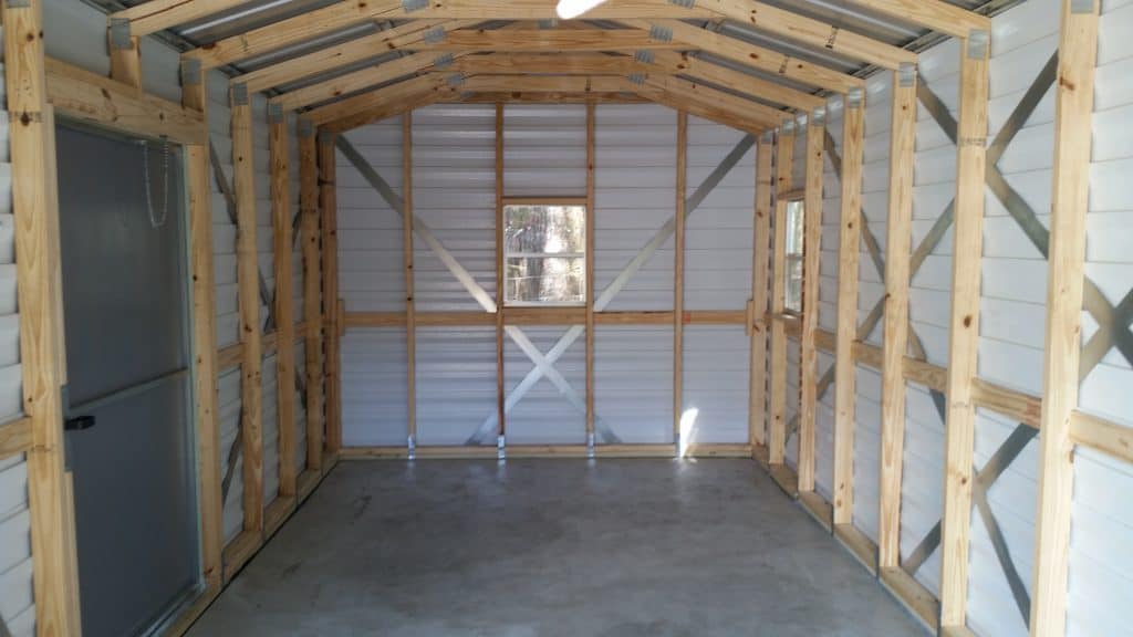 Wooden framing in the metal siding shed with windows and door Robin sheds Probuilt Structures Sheds For Sale In Central Florida Shed in citrus county and sheds in marion county 12x24