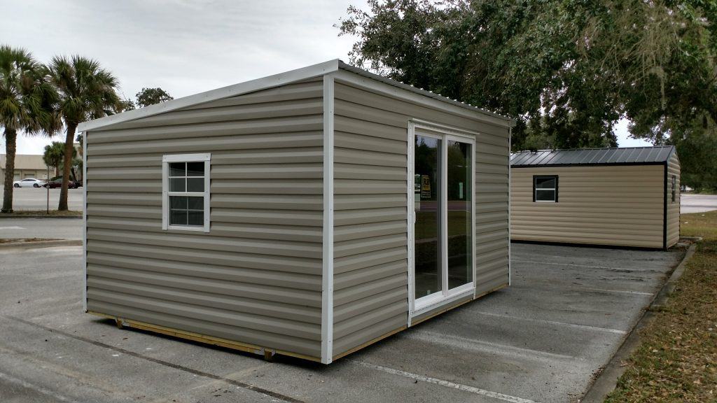 Single slope shed with sliding glass door and window with steel frame and metal siding Robin sheds Probuilt Structures Sheds For Sale In Central Florida Shed in citrus county and sheds in marion county 10x20