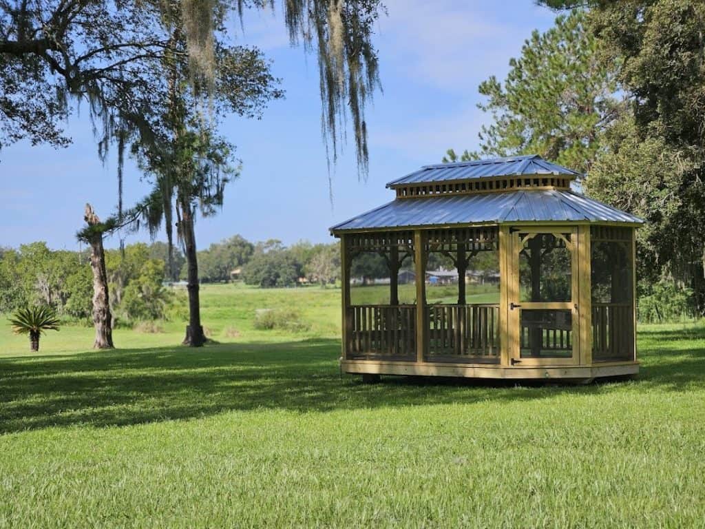Wooden screened gazebo for sale in Florida, offering a tranquil retreat in your backyard.