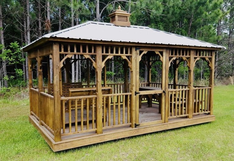 Wooden gazebo with metal roof for sale in Florida, perfect for outdoor gatherings and relaxation.