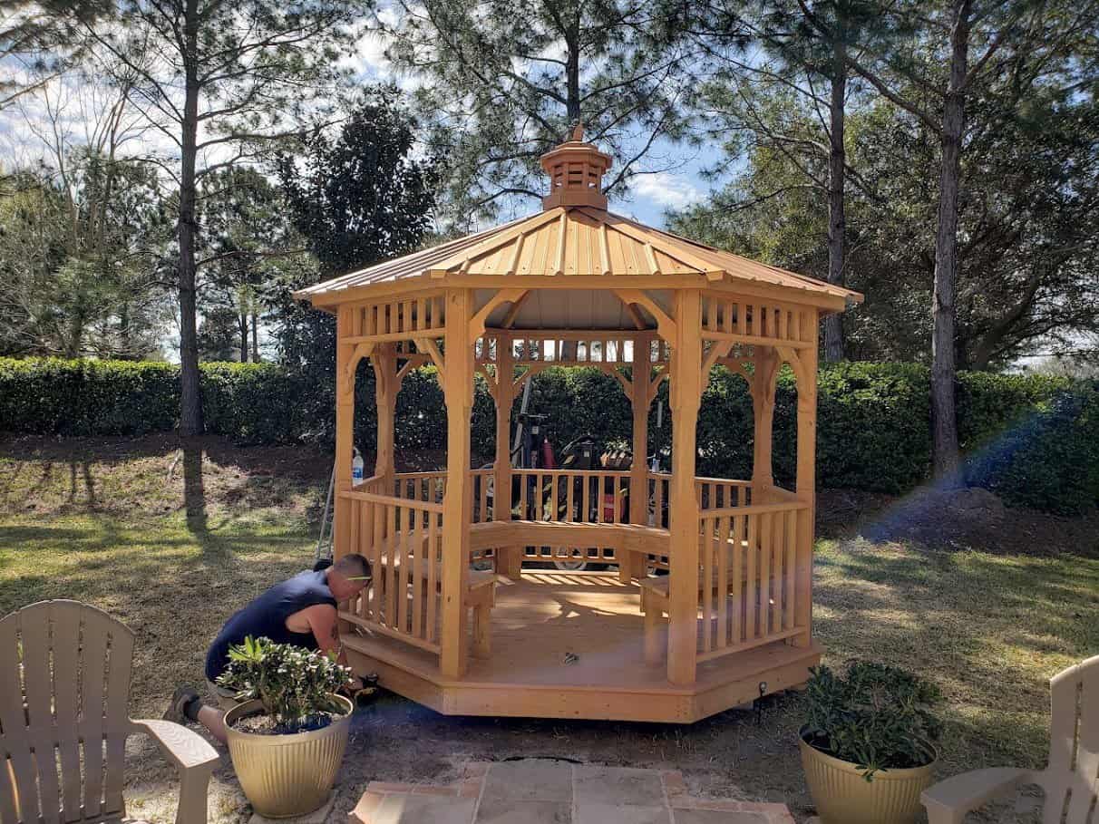Installed wooden backyard gazebo, adding charm and functionality to outdoor spaces.