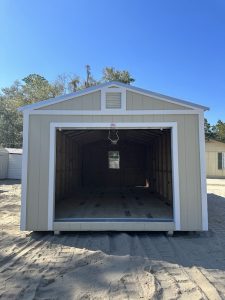 Wooden storage shed with rent-to-own financing available, providing convenient storage solutions.