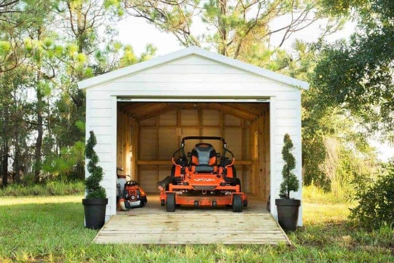 Roll-up garage door motorcycle sheds and garages for sale in St. Johns County