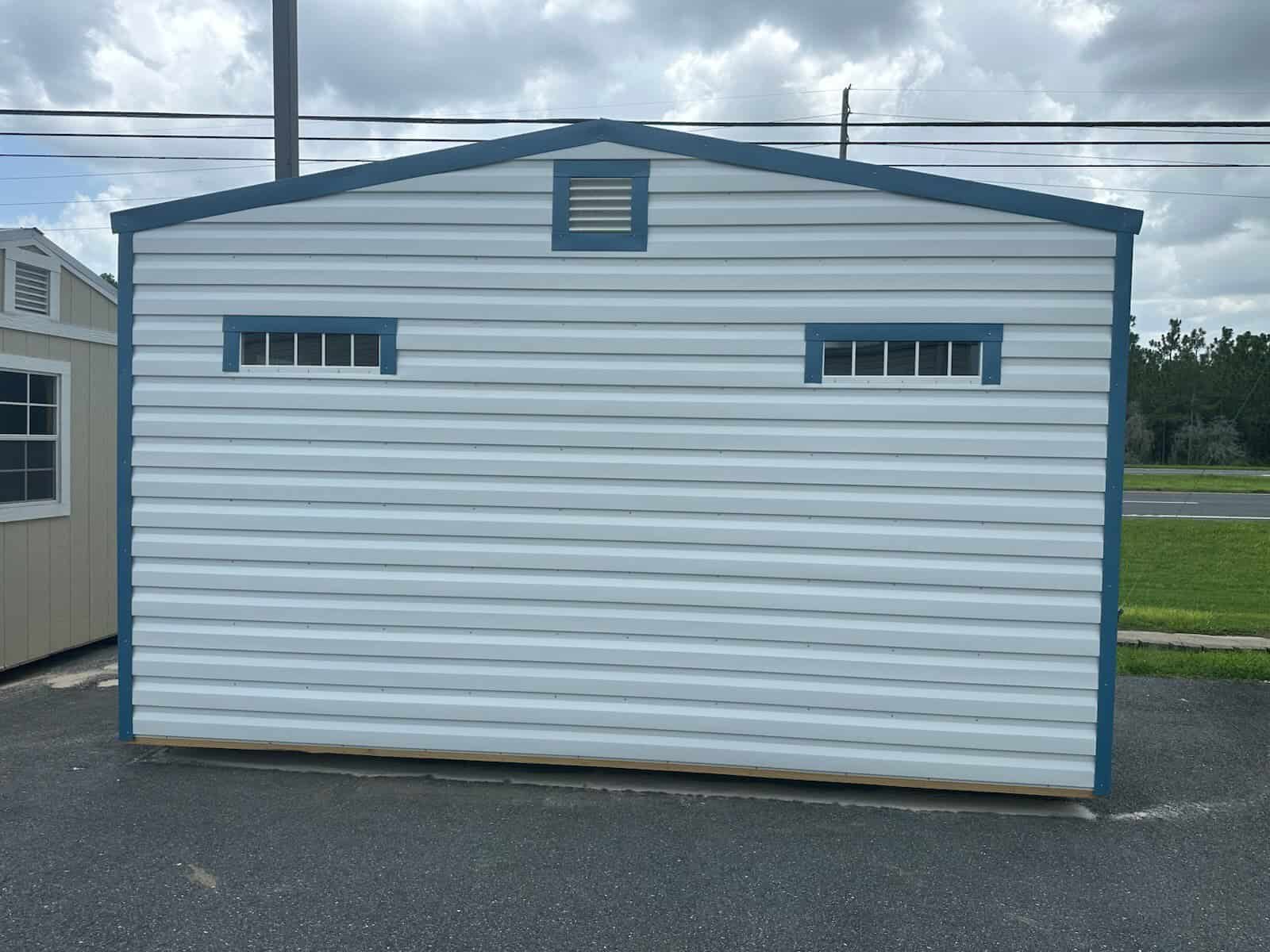 Rear view of 10x16 White Floridian Steel Shed with Hawaiian Blue trim and Galvalume roof