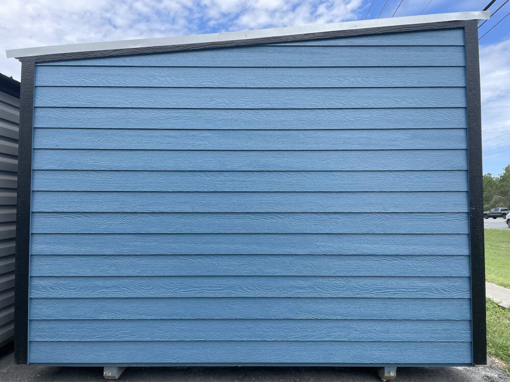 Side view of 12x24 Hawaiian Blue Vista Shed showing LP Smart Lap siding, Black trim, Galvalume metal roof, and transom windows