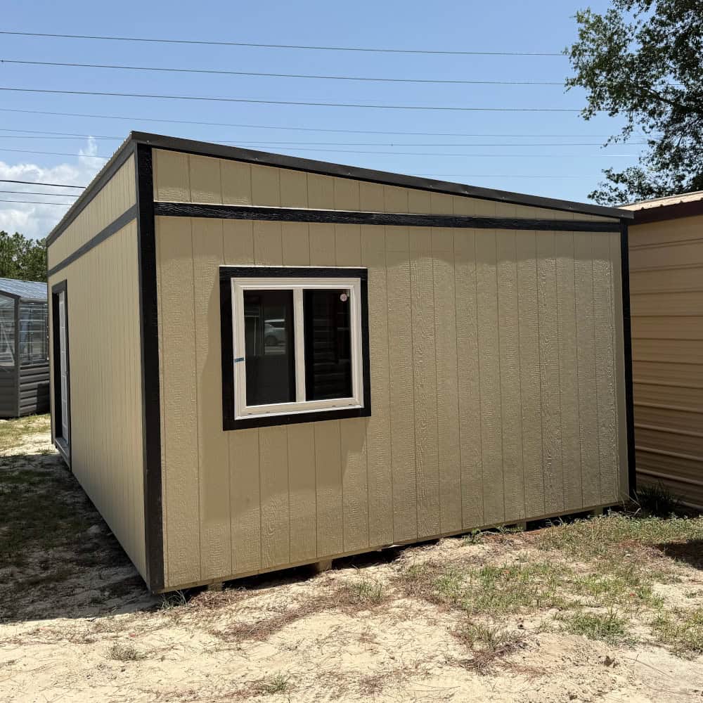 Right side view of 14x24 Light Stone Vista Shed showing Black trim, Charcoal metal roof, horizontal slide windows, and tall sidewalls