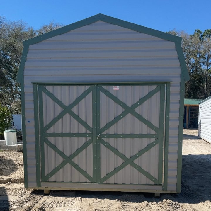 Front view of 10x20 Ash Gray Gambrel Barn with Moss Green trim and wide double doors with XX trim