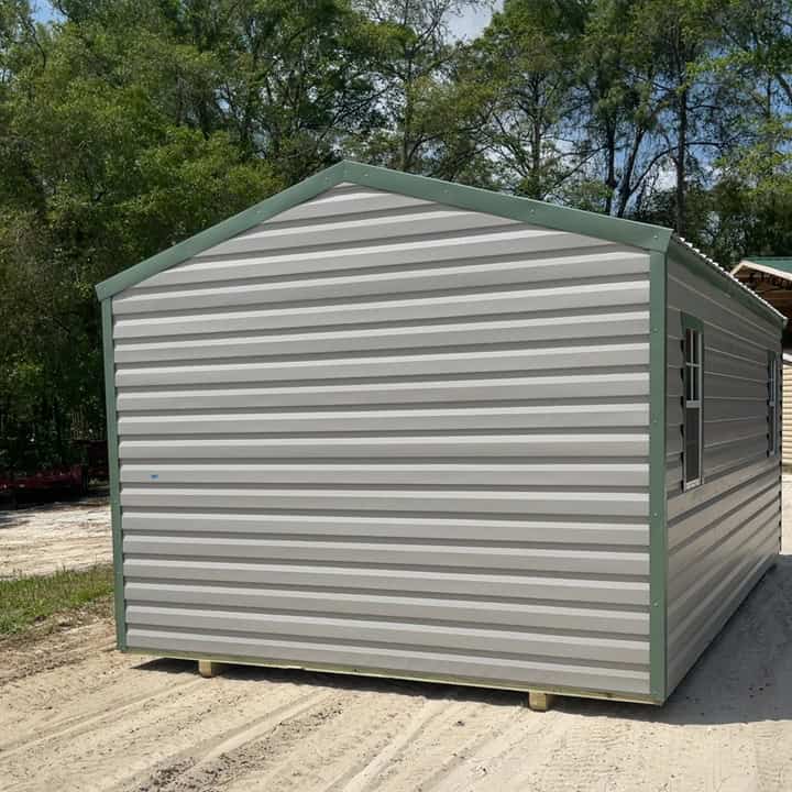Rear view of 12x20 Ash Gray Americana Steel Shed with Moss Green trim and Galvalume roof